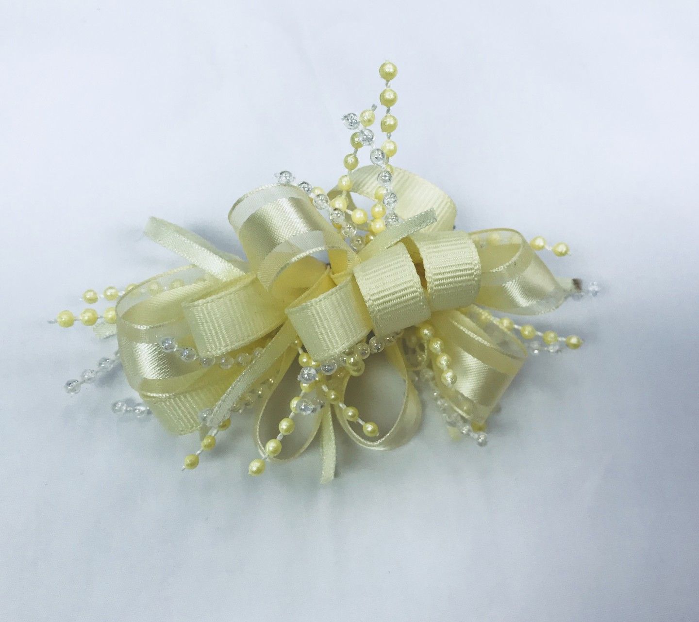 CHEE CHEE IVORY BOW WITH BEADS