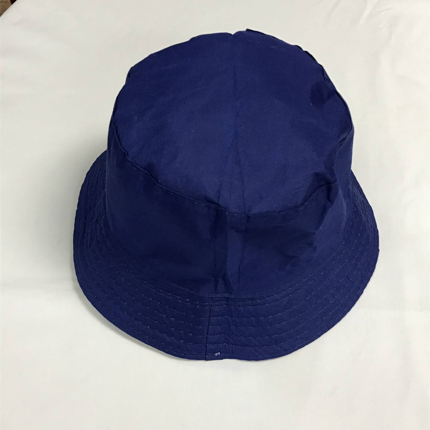 NAVY REVERSIBLE BUCKET HAT 12+