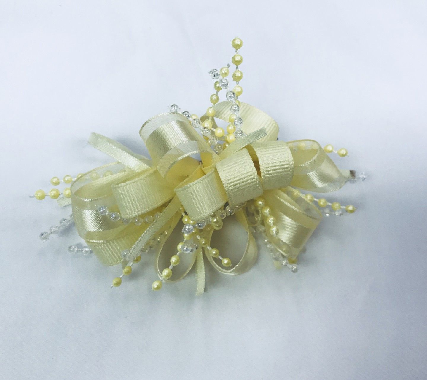 CHEE CHEE IVORY BOW WITH BEADS